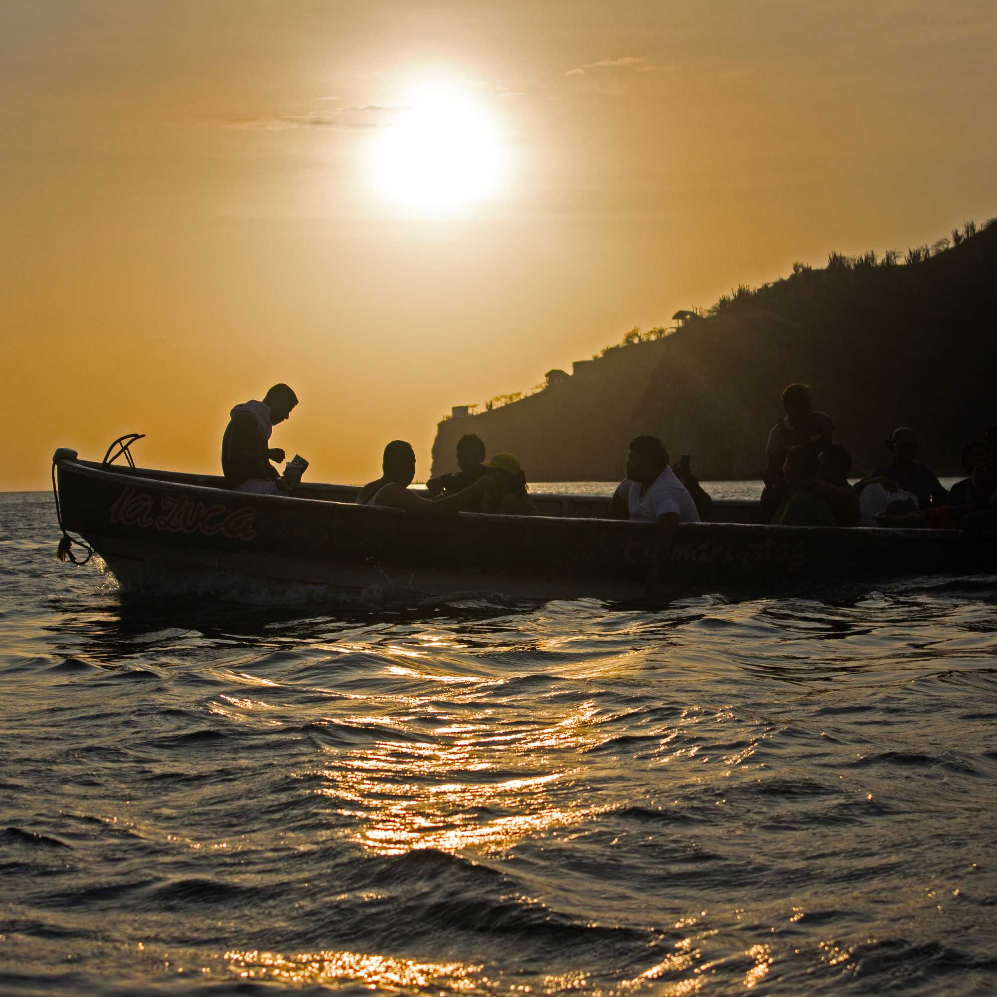 Silhouettes on the waves