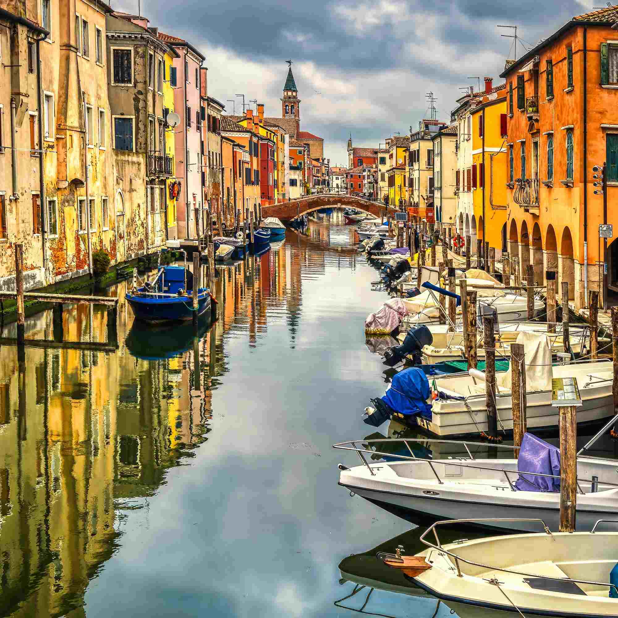 Vibrant Reflections on Chioggia’s Historic Canal – A Fine Art Photograph