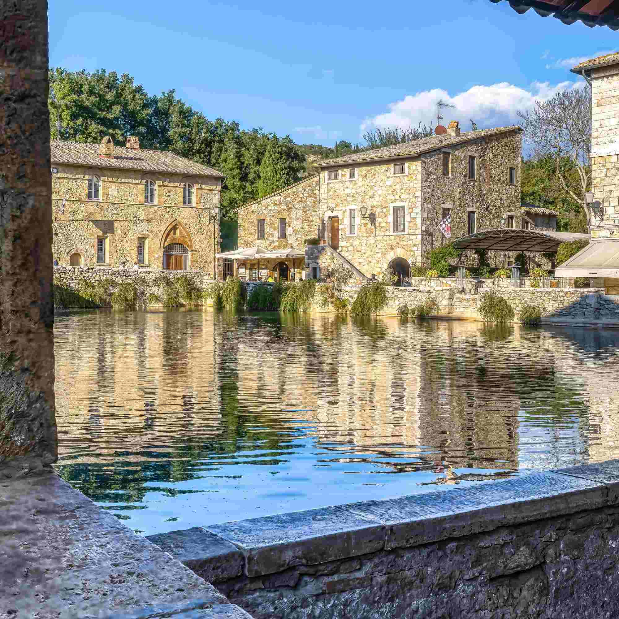 Through the Arch: Reflections of Bagno Vignoni – A Fine Art Photograph