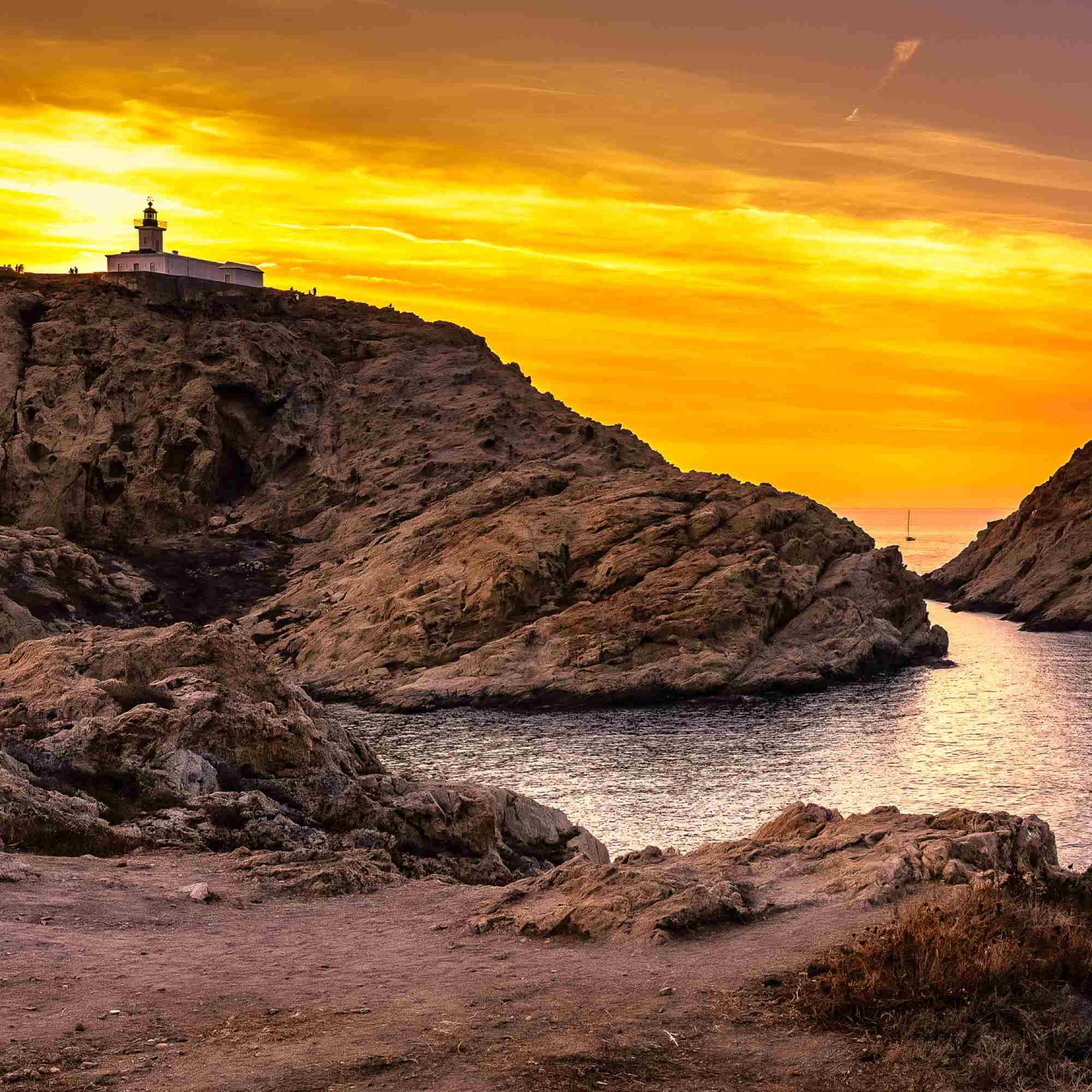 Lighthouse of Pietra under a Fiery Sky – A Fine Art Photograph 