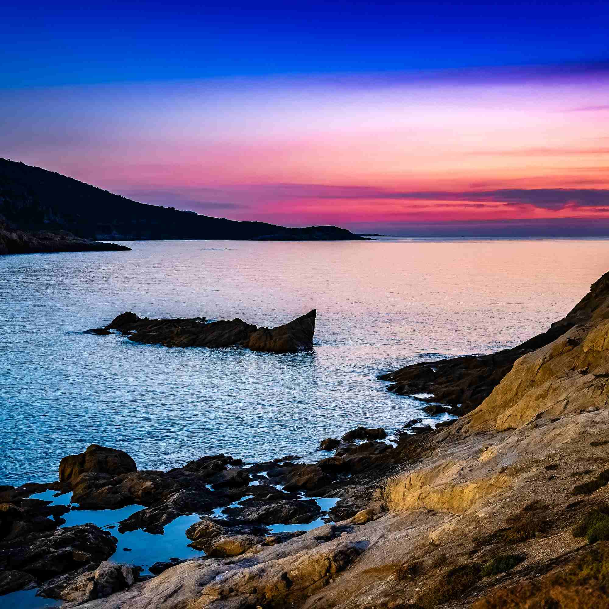Twilight Reverie over the Red Cliffs of Île-Rousse - A Fine Art Photograph