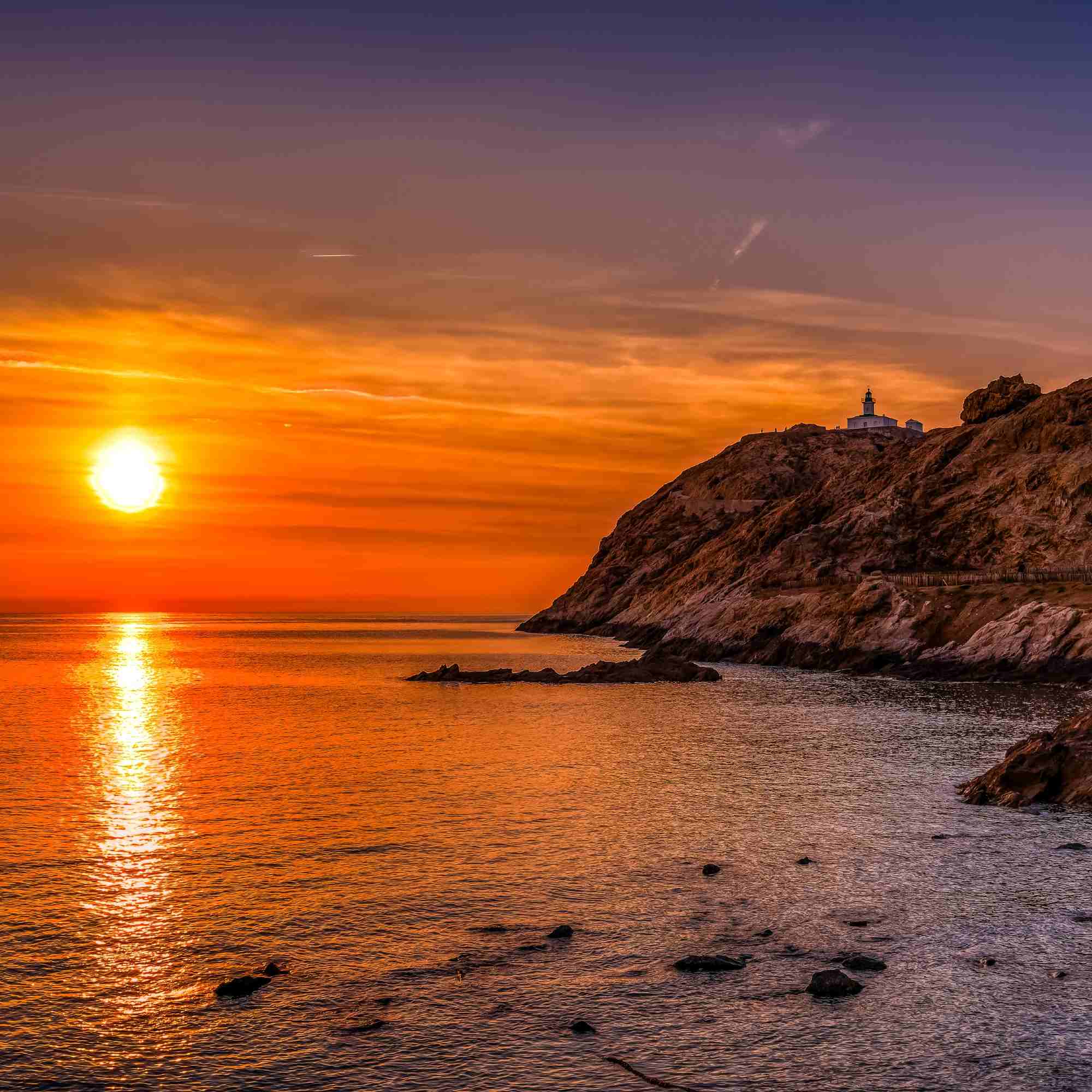 Golden Sunset over Phare de la Pietra and Genoese Tower – A Fine Art Photograph  